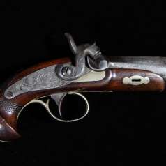 Derringer Pistol with engraved lockplate